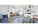 Inviting living room featuring hardwood floors, stylish decor, and abundant natural light at 1514 Patterson Ave, Charleston, SC 29412