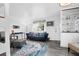 Sunlit living room with stylish decor, hardwood floors, and inviting seating arrangements at 1514 Patterson Ave, Charleston, SC 29412