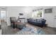 Cozy living room with modern decor, showcasing a comfortable sofa and ample natural light at 1514 Patterson Ave, Charleston, SC 29412