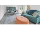 Bright living room with a dining room, sofa, and backyard view at 1514 Patterson Ave, Charleston, SC 29412