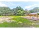 Neighborhood park with playground equipment and mature trees offering recreational space at 1514 Patterson Ave, Charleston, SC 29412