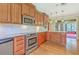Well-appointed kitchen with granite countertops, tile backsplash, and stainless steel appliances at 17 Johnson Rd, Charleston, SC 29407
