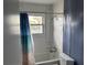 Bathroom features a shower/tub combo and a window with natural light at 1736 E Ashley Ave, Folly Beach, SC 29439