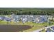 An aerial view of beautiful single-Gathering homes near a pond surrounded by lush green lawns at 1787 Timmons St, Mount Pleasant, SC 29466