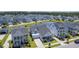 An aerial view of the community showcasing the beautiful homes, pond, and lush landscaping at 1787 Timmons St, Mount Pleasant, SC 29466