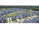 Stunning aerial perspective of a residential area with a calming pond and lush greenery at 1787 Timmons St, Mount Pleasant, SC 29466