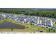 High-angle view of a residential community featuring houses and a picturesque pond at 1787 Timmons St, Mount Pleasant, SC 29466