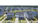 Scenic aerial view of a residential neighborhood with a central pond feature at 1787 Timmons St, Mount Pleasant, SC 29466