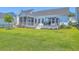 Beautiful backyard with patio, outdoor kitchen, and ample green space for outdoor enjoyment at 1787 Timmons St, Mount Pleasant, SC 29466
