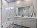 Modern bathroom features a glass-enclosed shower, double vanity, and contemporary fixtures at 1787 Timmons St, Mount Pleasant, SC 29466