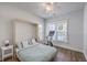 Well-lit bedroom with a murphy bed, sleek floors, and large windows for natural light at 1787 Timmons St, Mount Pleasant, SC 29466