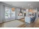 Bright dining area with a large window and modern light fixture at 1787 Timmons St, Mount Pleasant, SC 29466