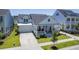 Well-maintained home with a neat front lawn, garage, and a cozy porch at 1787 Timmons St, Mount Pleasant, SC 29466