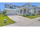 Exterior elevation of a beautiful single-Gathering home with an attached garage and well-manicured lawn at 1787 Timmons St, Mount Pleasant, SC 29466