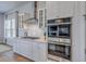 Modern kitchen with stainless appliances, white cabinetry, and ample counter space at 1787 Timmons St, Mount Pleasant, SC 29466