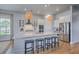 Spacious kitchen island features a large quartz countertop, with pendant lighting at 1787 Timmons St, Mount Pleasant, SC 29466