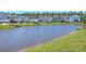 Picturesque pond surrounded by lush greenery and charming residential homes at 1787 Timmons St, Mount Pleasant, SC 29466