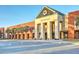 Impressive school entrance with grand pillars, glass facade, and ample space, welcoming students and visitors at 1787 Timmons St, Mount Pleasant, SC 29466
