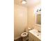 Bathroom featuring standard toilet, vanity with sink, medicine cabinet, and exhaust fan at 1925 Kerry St, North Charleston, SC 29406