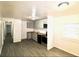A kitchen with gray cabinets, wood countertops, stainless-steel appliances and wood-look floors at 1925 Kerry St, North Charleston, SC 29406