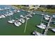 Scenic aerial view of a marina featuring a variety of boats docked in tranquil green waters at 2 Mcdonough Rd # B-11, Folly Beach, SC 29439