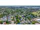 Extensive aerial view shows many houses in a residential community close to sports field and industrial area at 200 Fishburne St, Charleston, SC 29403