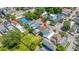 Captivating aerial view of a charming neighborhood featuring lush greenery and diverse architectural styles at 200 Fishburne St, Charleston, SC 29403