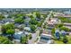 Spectacular aerial view of street lined with houses and abundant trees at 200 Fishburne St, Charleston, SC 29403