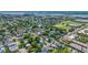 Vibrant aerial view displays a densely populated residential neighborhood near baseball field, with bridges in the distance at 200 Fishburne St, Charleston, SC 29403