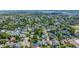 Grand aerial view of densely packed houses and tree-lined streets in charming residential neighborhood at 200 Fishburne St, Charleston, SC 29403