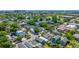 Vibrant aerial view of residential street with houses and lush green trees at 200 Fishburne St, Charleston, SC 29403
