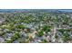 Extensive aerial shows densely packed neighborhood, with many homes and mature landscaping surrounding community streets at 200 Fishburne St, Charleston, SC 29403