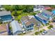 Aerial view of colorful homes with unique architectural details and lush green landscaping at 200 Fishburne St, Charleston, SC 29403