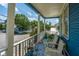 Cozy balcony with classic chairs and quaint decor, providing a relaxing outdoor space to enjoy the view at 200 Fishburne St, Charleston, SC 29403