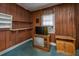 Bedroom features paneled walls, a television, and a window with blinds at 200 Fishburne St, Charleston, SC 29403