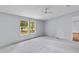Cozy bedroom featuring a ceiling fan and natural light, creating a comfortable and welcoming space at 201 Frank St, Summerville, SC 29483