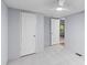 Clean bedroom with a ceiling fan, showcasing easy access to other rooms at 201 Frank St, Summerville, SC 29483