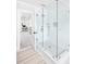 Modern bathroom featuring a frameless glass shower and white subway tile, creating a clean, open feel at 202 Bank St, Mount Pleasant, SC 29464