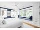 Bright bedroom with built-in window seat, custom cabinetry, and ample natural light at 202 Bank St, Mount Pleasant, SC 29464