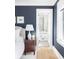 Stylish bedroom with designer bedside table, access to ensuite bathroom with elegant decor at 202 Bank St, Mount Pleasant, SC 29464