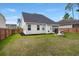 Spacious backyard featuring a cozy fire pit and lovely view at 203 Yeamans Way, Summerville, SC 29483