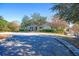 Attractive building exterior with well-maintained landscaping and ample parking for residents and visitors at 203 Yeamans Way, Summerville, SC 29483
