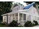 Beautiful home featuring a screened-in porch perfect for outdoor entertaining and relaxation at 2101 Wappoo Dr, Charleston, SC 29412