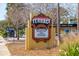 View of the Terrace Plaza sign advertising businesses at 2101 Wappoo Dr, Charleston, SC 29412
