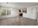 Bright living room with tile floors, and kitchen area at 215 Jackson St, Goose Creek, SC 29445