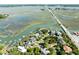 Breathtaking aerial view of a waterfront community with scenic marsh views and a bridge to other areas at 2363 Palmer Creek Bnd, Charleston, SC 29412