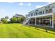 Backyard with covered patio and second story deck at 2363 Palmer Creek Bnd, Charleston, SC 29412