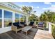 Outdoor deck featuring patio furniture with a view of lush greenery at 2363 Palmer Creek Bnd, Charleston, SC 29412