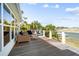 Outdoor deck featuring patio furniture with a view of the water at 2363 Palmer Creek Bnd, Charleston, SC 29412