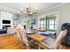 Elegant dining room adjacent to the living area with glass doors to backyard at 2363 Palmer Creek Bnd, Charleston, SC 29412